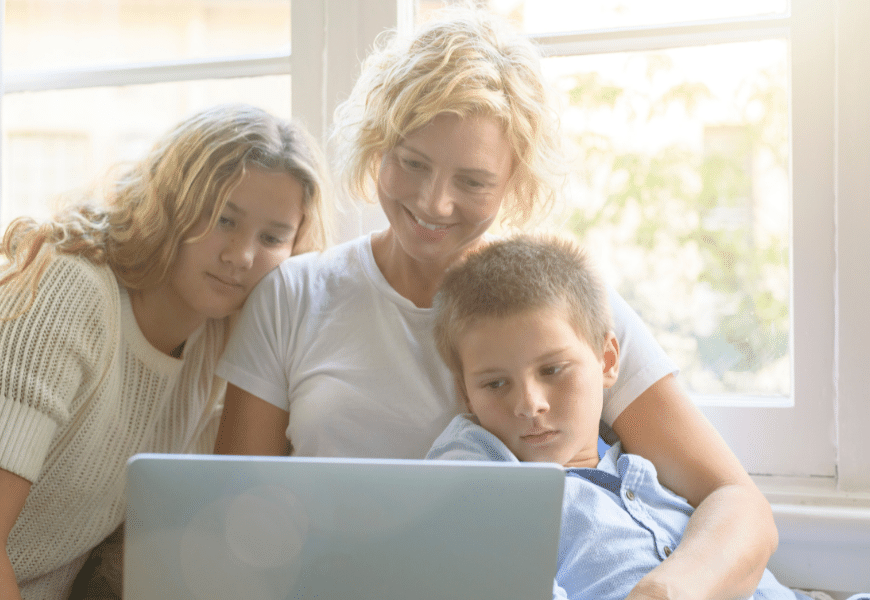 mother-and-children-at-home-using-laptop