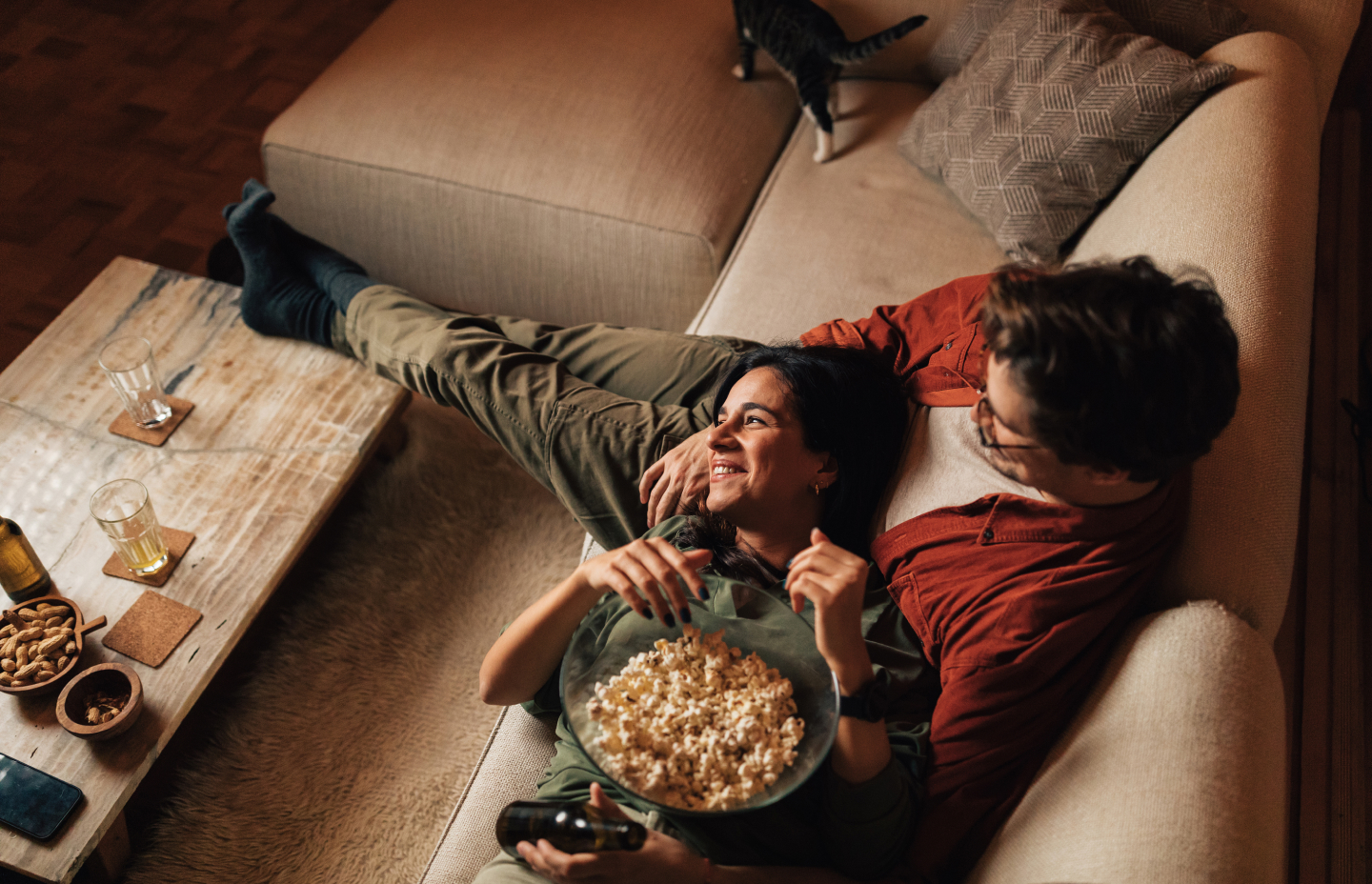 image of 2 people watching 